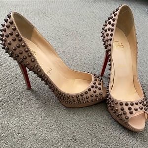 SOLD Spiked Louboutin nude peep toe pumps